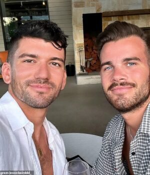 111602891-16177565-Pictured_Luke_Davies_with_Jesse_Baird-a-13_1790947505842.jpg