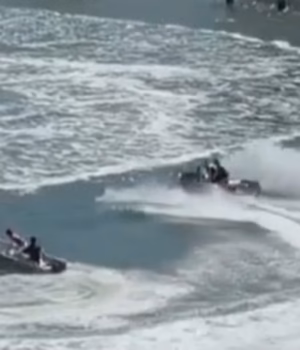 111692443-16188503-Two_teenagers_hooning_around_in_their_jet_ski_on_the_Gold_Coast_-a-5_179134221045.avif