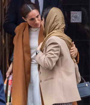 111758047-16195963-The_intensity_of_Meghan_s_warmth_towards_Malala_was_to_show_thei-m-14_17915553751.avif