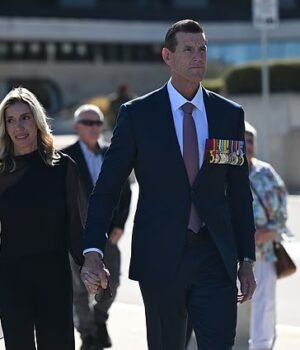 111786703-16199669-Ben_Roberts_Smith_right_and_Sarah_Matulin_left_-a-17_1791680229581.jpg