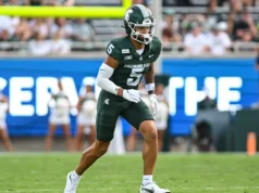 O estado de Michigan decidiu erroneamente o impedimento após recuperar o chute lateral na derrota por 38-37 na prorrogação para Illinois