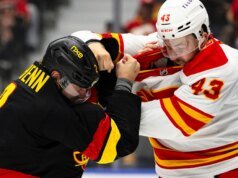 Marilainen fez 23 defesas em sua estreia como titular pelos Canucks na vitória por 4 a 1 sobre o Flames