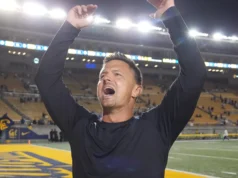 A temporada histórica dos Bruins enfrenta um teste difícil contra Wisconsin