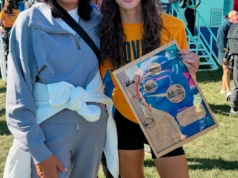 A filha do falecido Marquette venceu a Maratona Lakefront