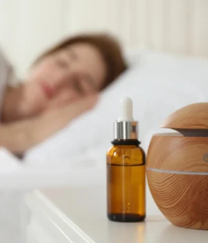 woman-sleeping-deeply-essential-oil-aroma-diffuser.webp